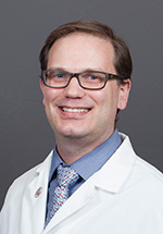 Clint Williamson, M.D.