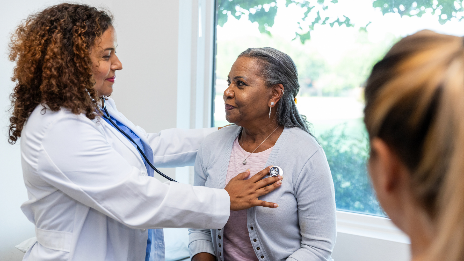 Patient getting examined by doctor
