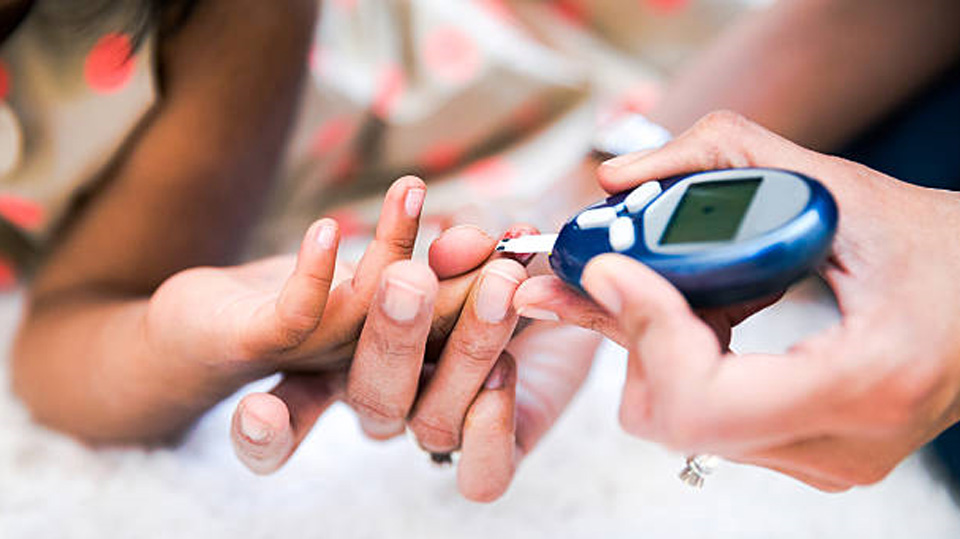 Woman getting her blood levels checked