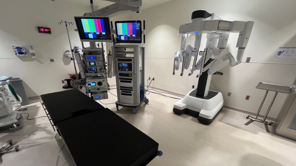 Hospital room with robotic surgery machines