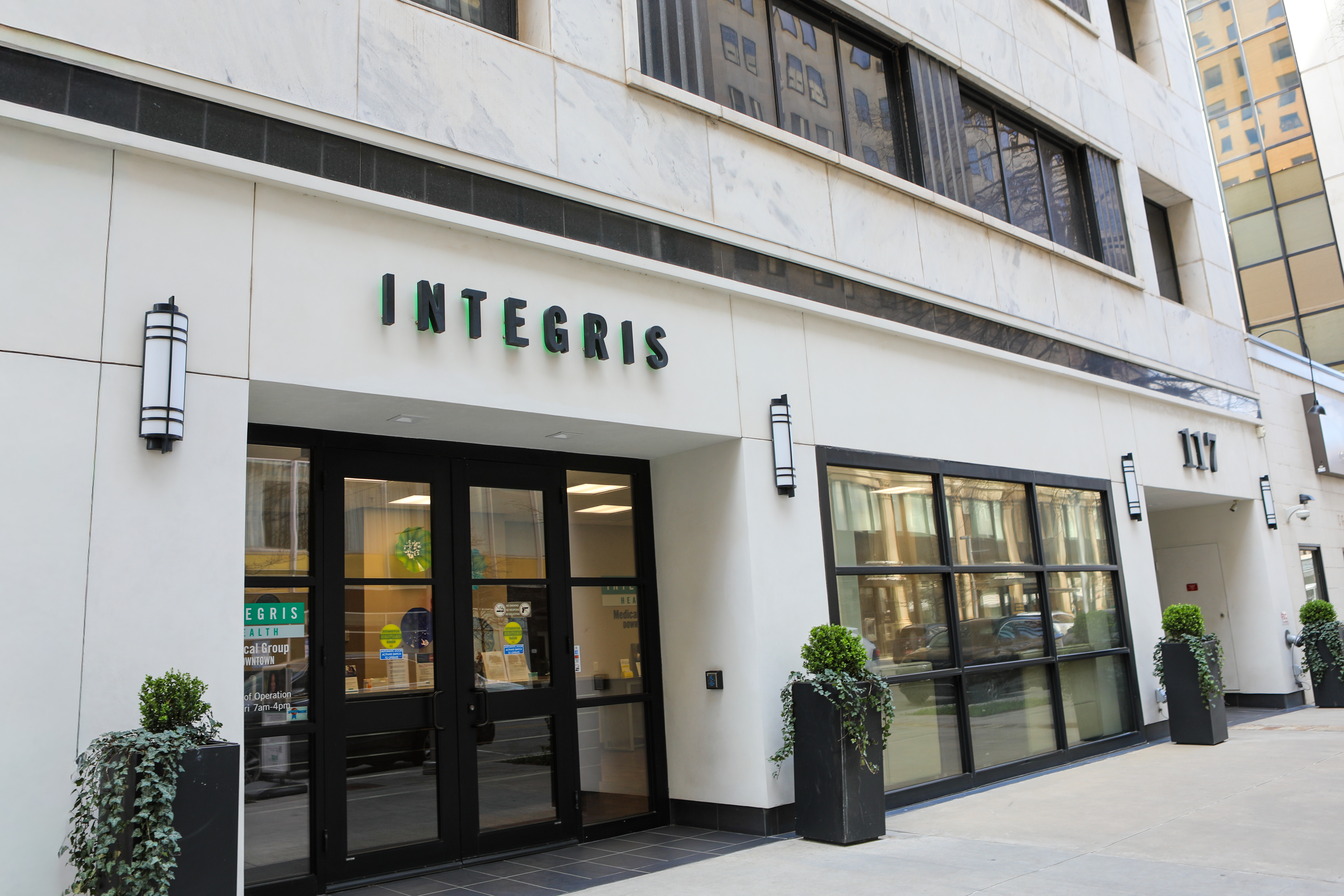 Exterior shot of building with an INTEGRIS Health sign on the front