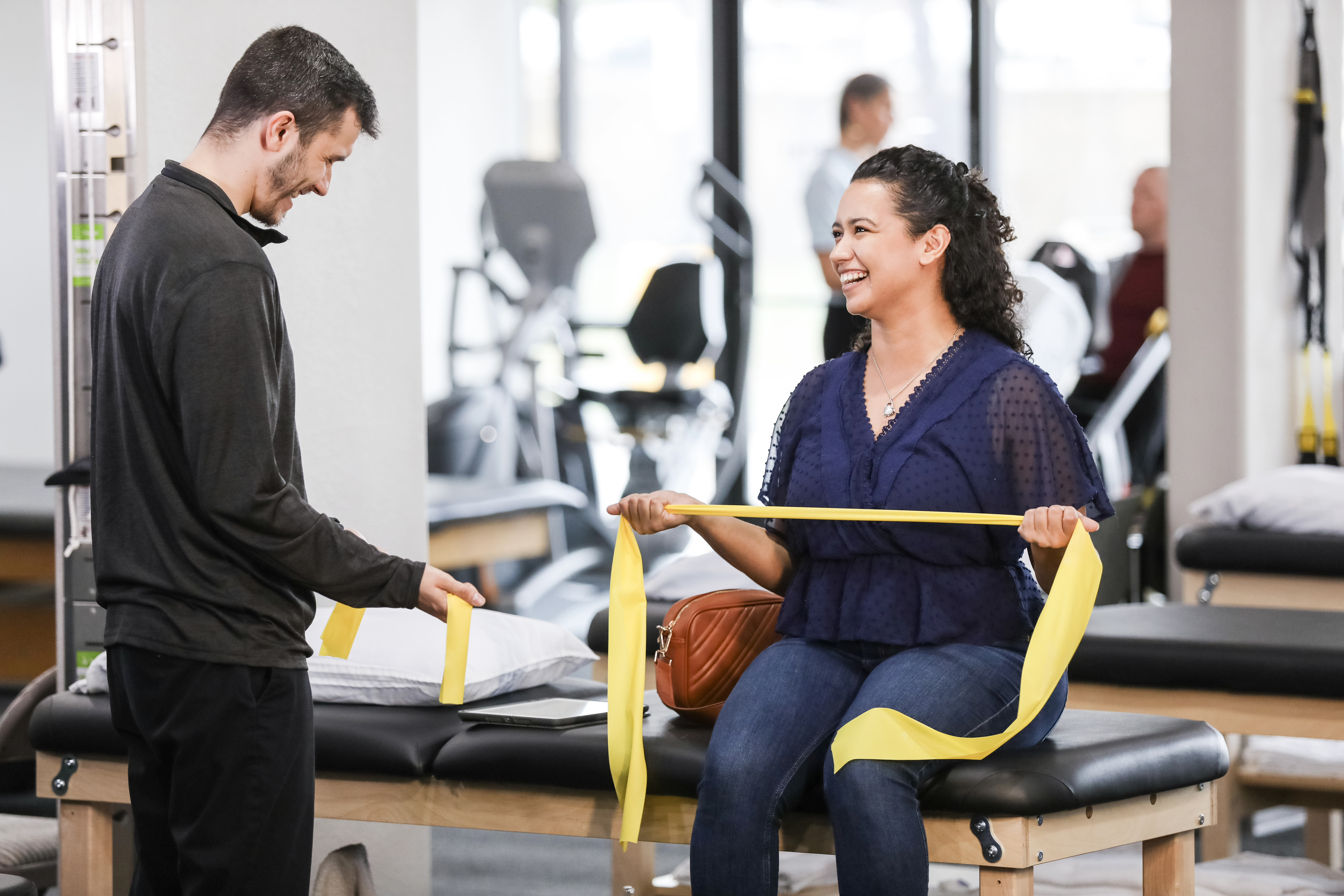 Patient doing exercises with a band