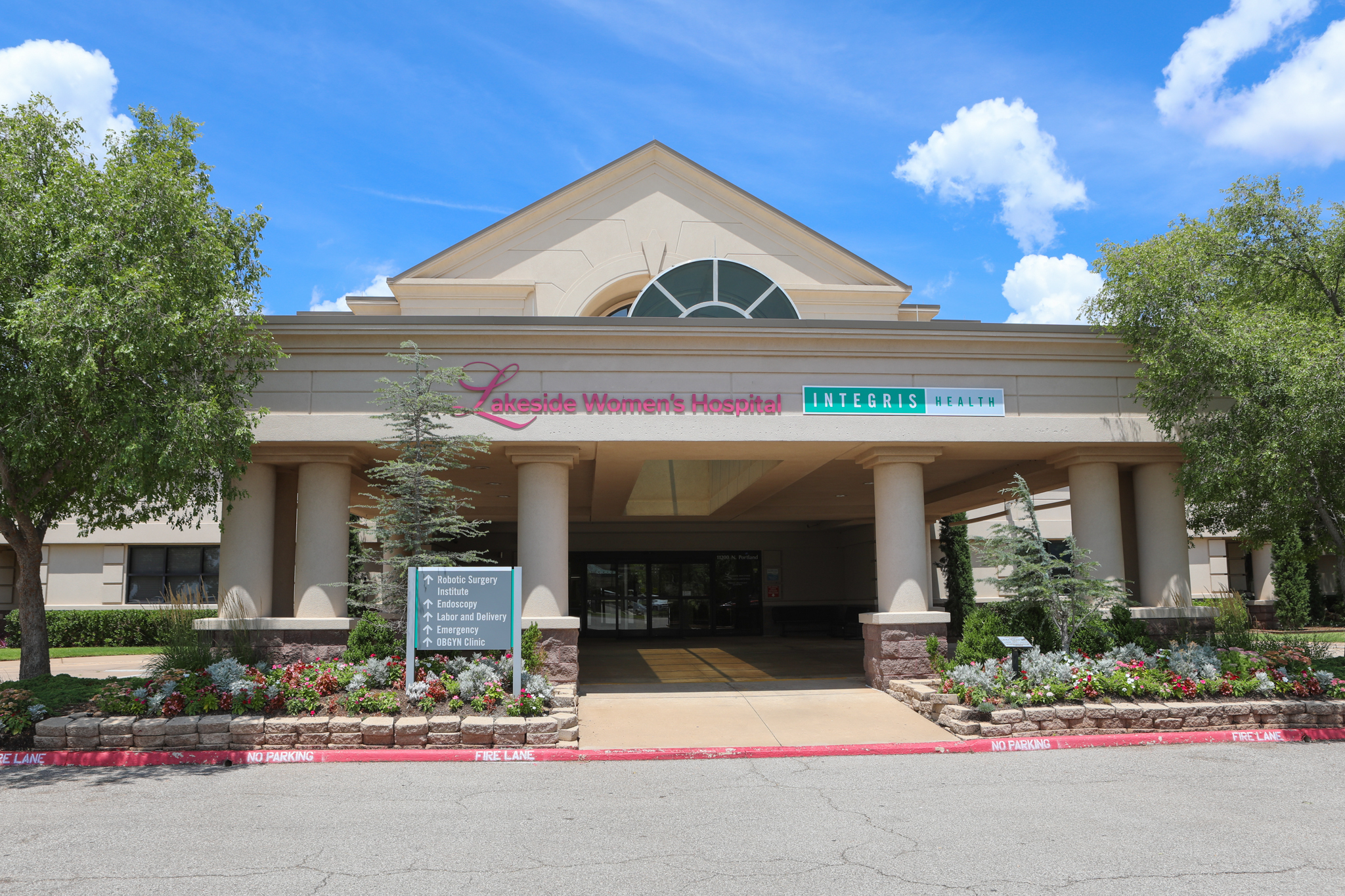 Exterior shot of a white building with two columns