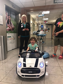 Child in remote control car