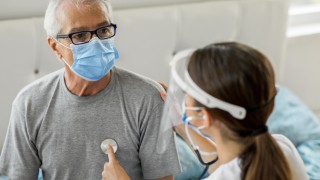 Doctor examining patient