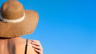 Woman Sun Tanning