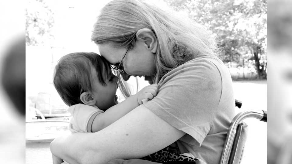 Woman holding child