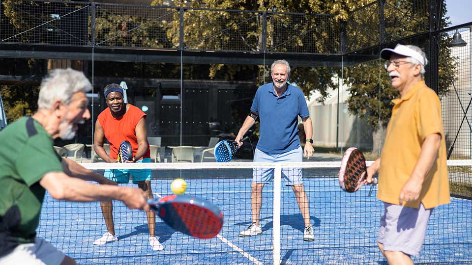 Men playing pickleball