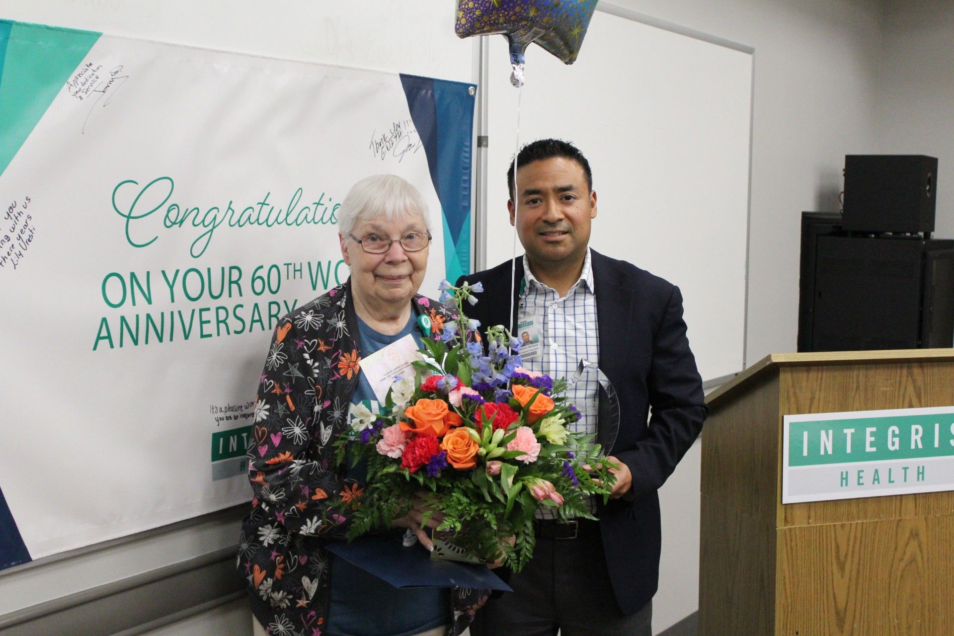 Celebrating the 60th employment anniversary celebration for Edith Rath