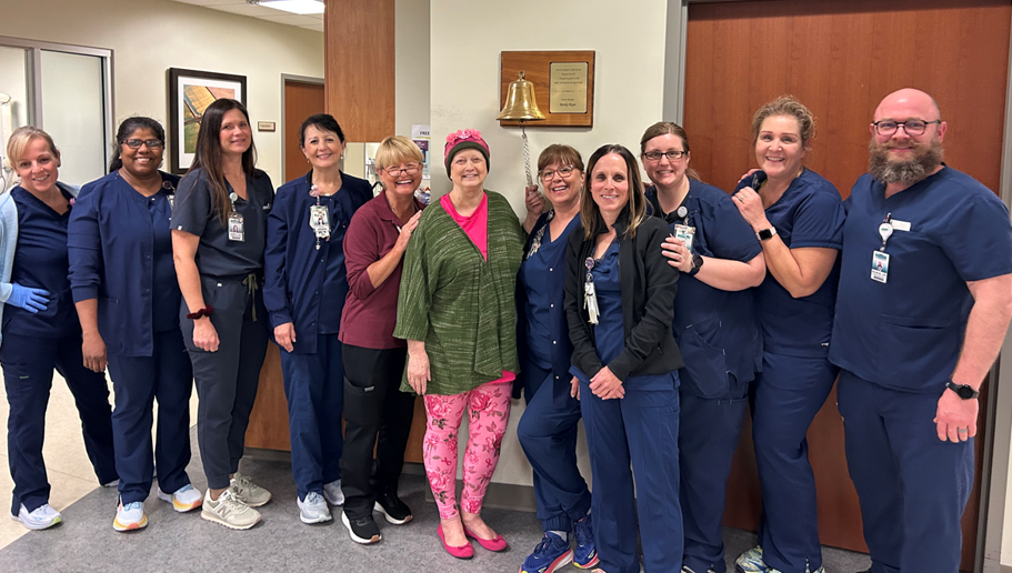 Patricia posing with the INTEGRIS Health cancer team