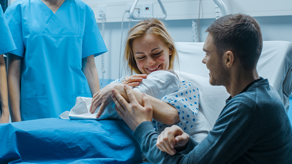 Happy Family in the Modern Delivery Ward