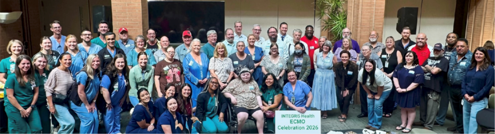 Group of people smiling and posing together