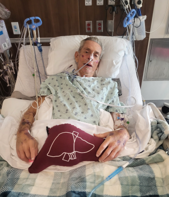 Phillip Eagleton laying down in a hospital bed