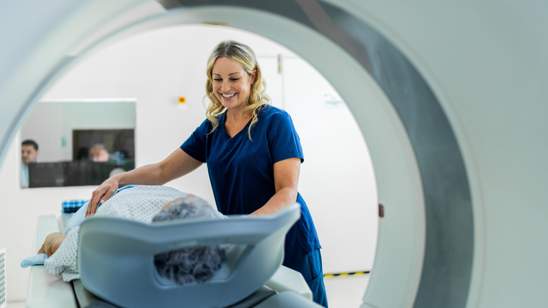 Mid adult nurse during magnetic resonance exam at hospital