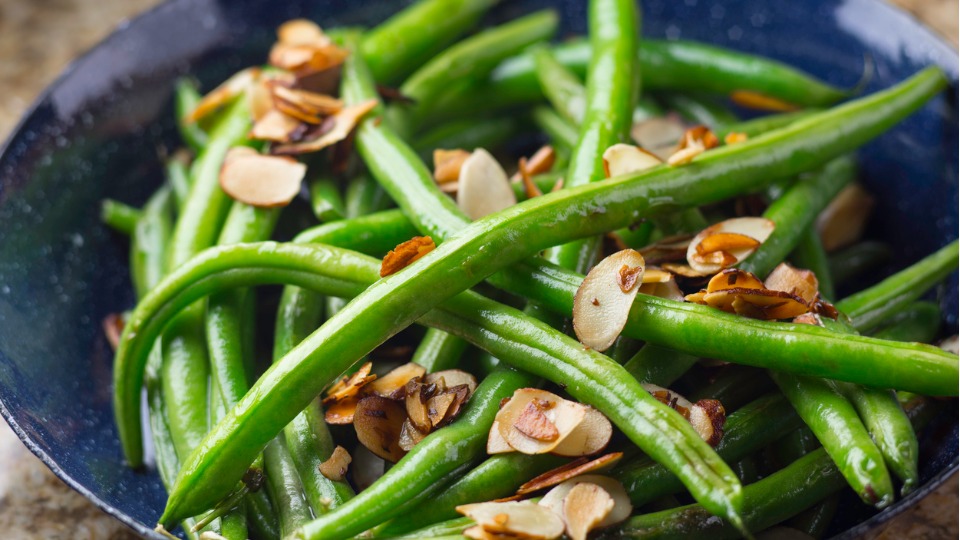close up on green beans with almonds