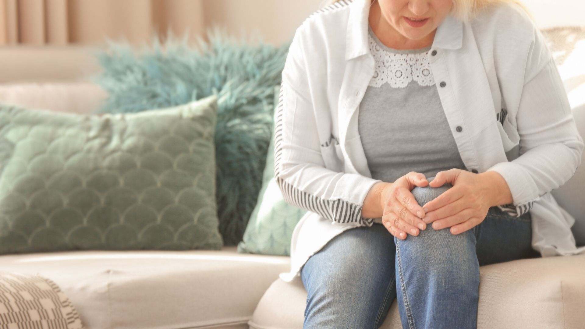 Woman Holding Knee