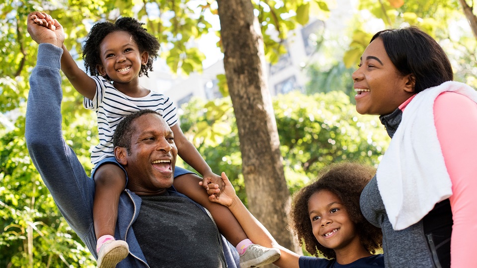 Family playing in park