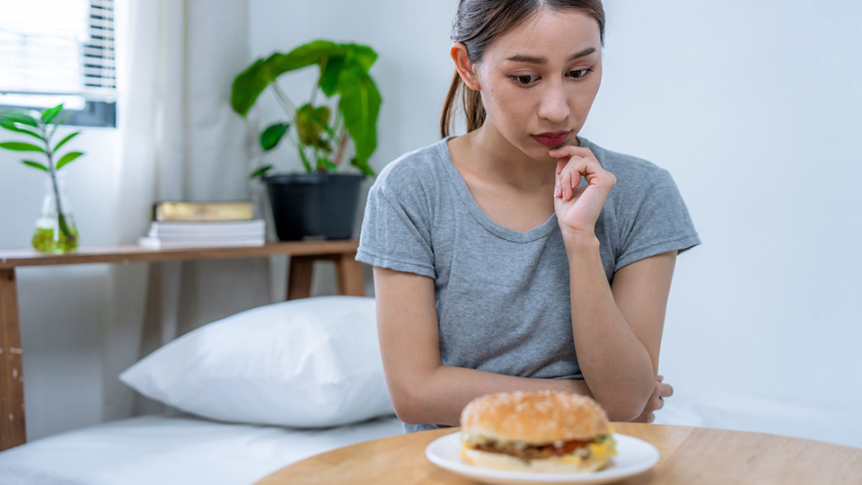 woman looking at food