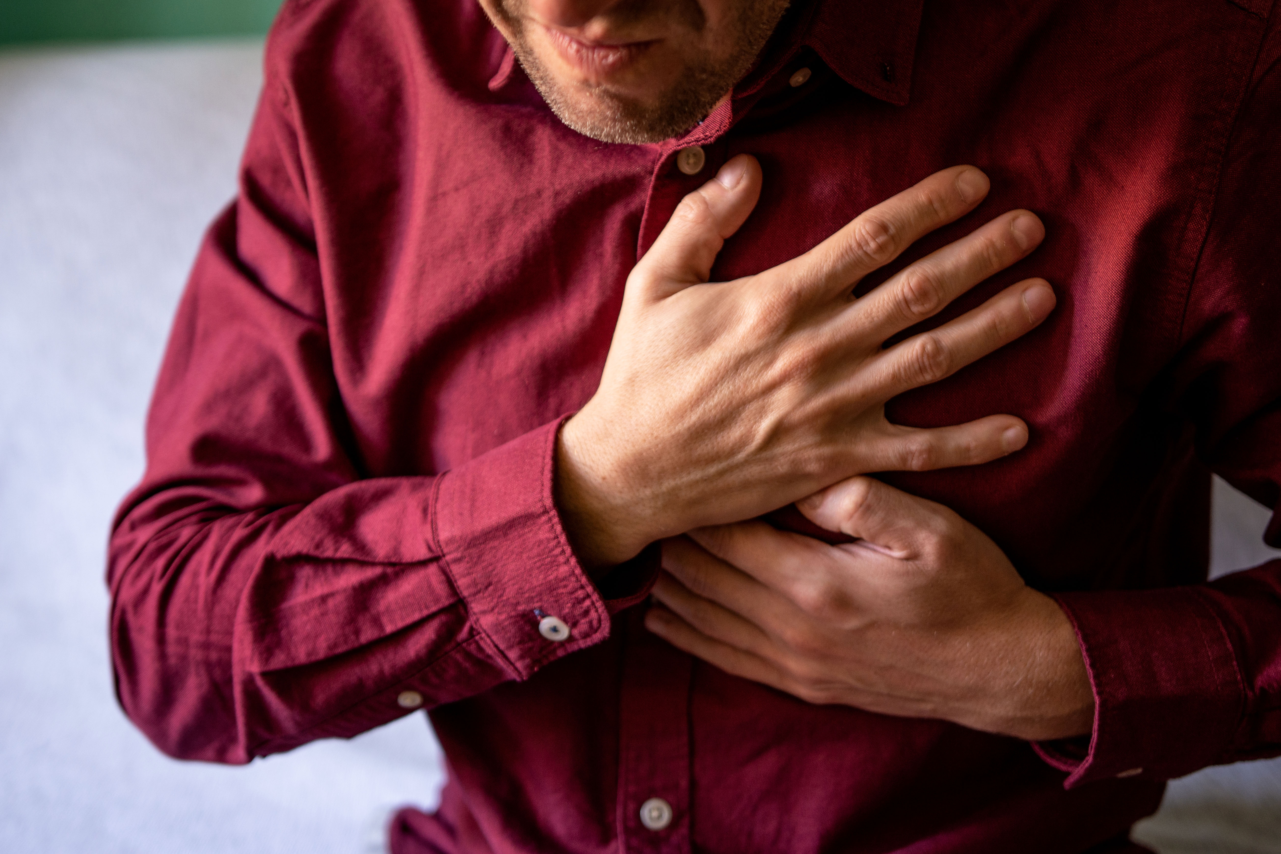 Man with chest pain suffering from a heart attack