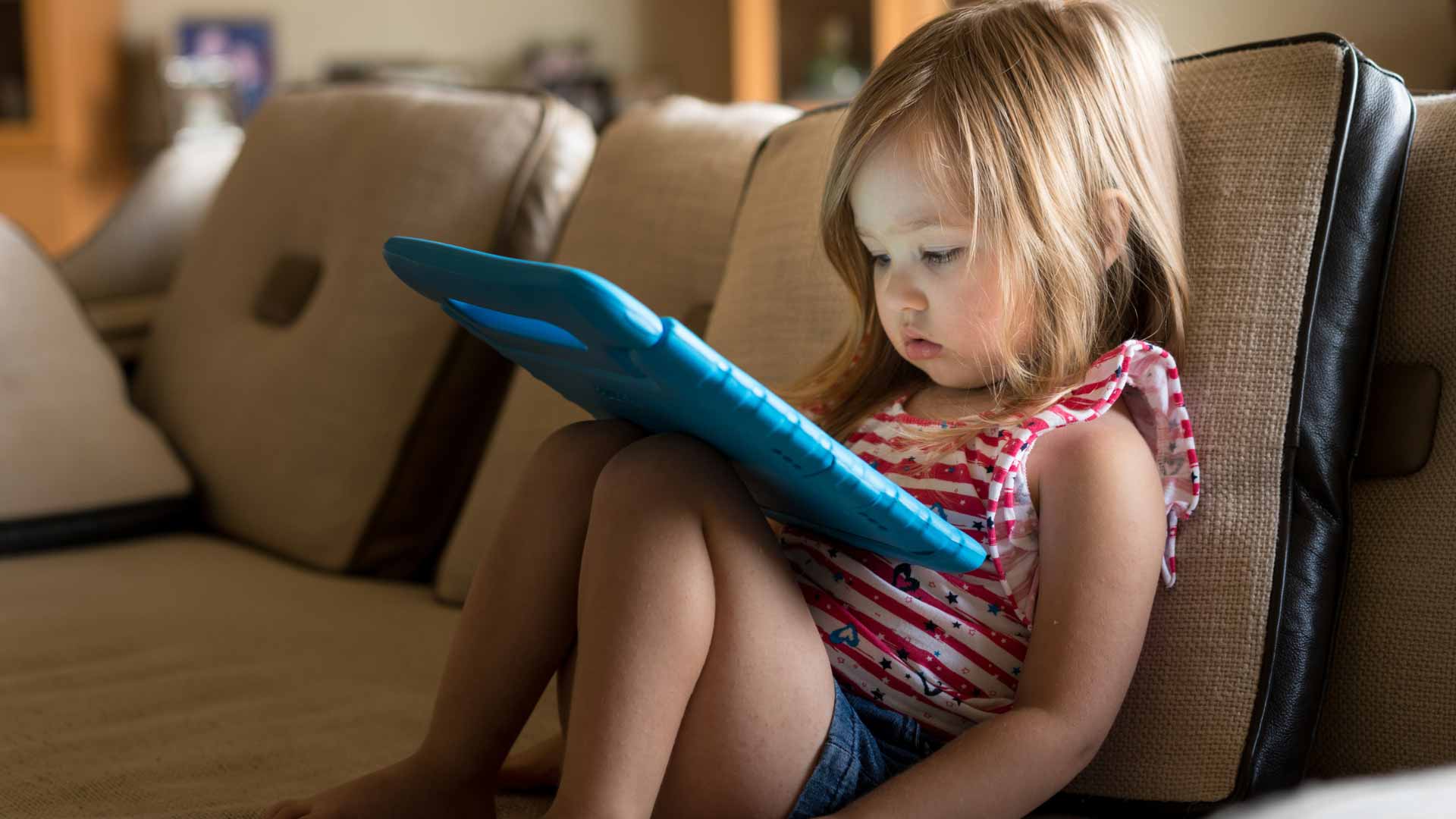 child staring at screen