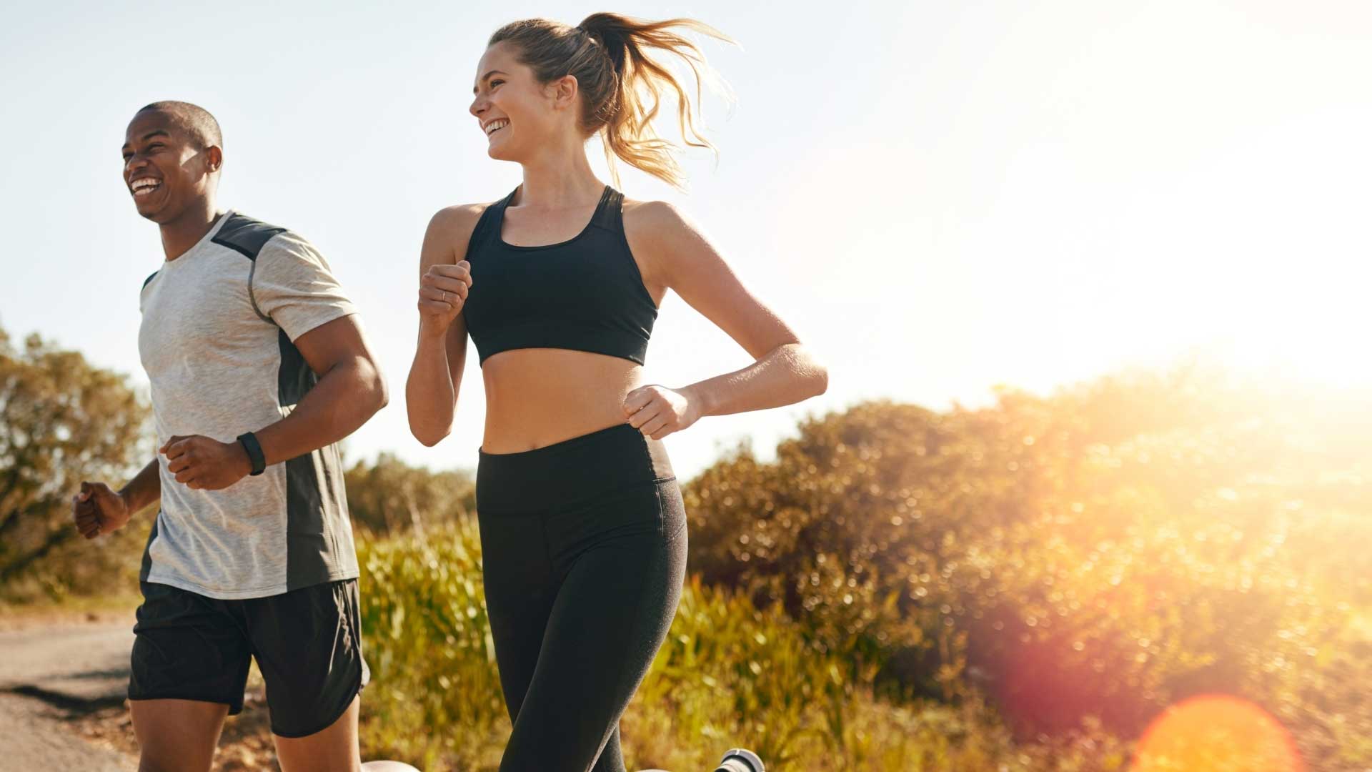 woman and man running