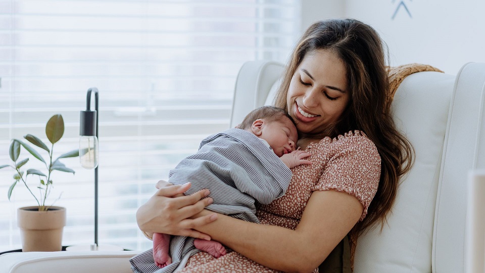 Holding a Newborn