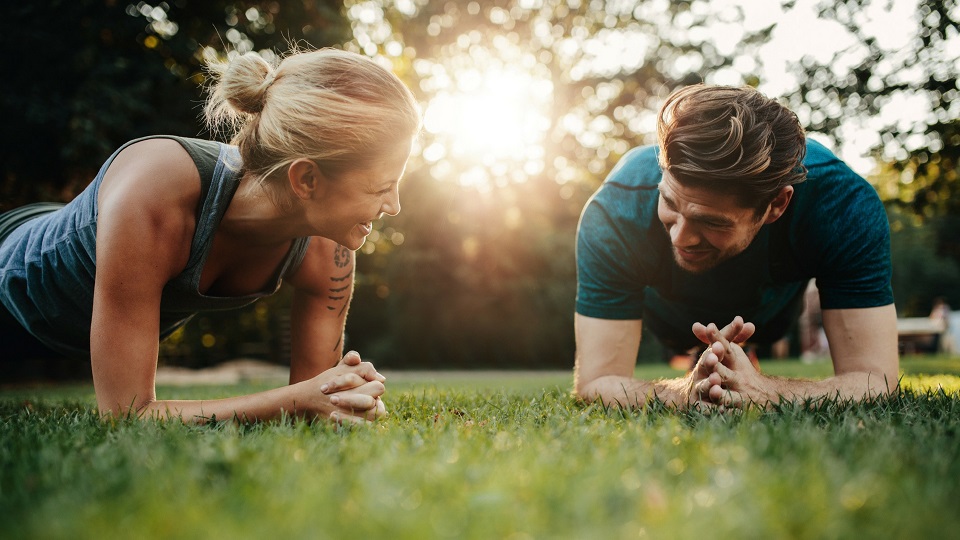 man and woman planking
