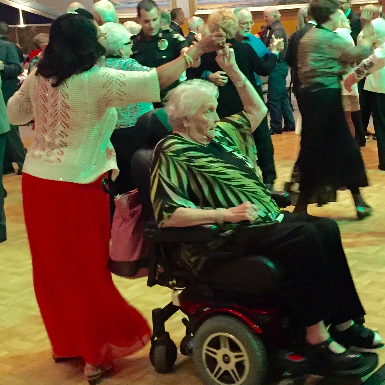 woman in a wheelchair on the dance floor