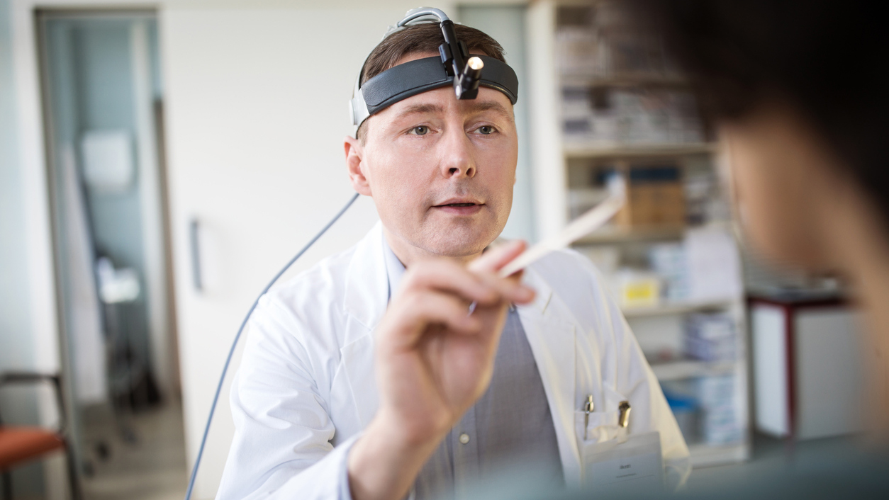 Doctor examining patient