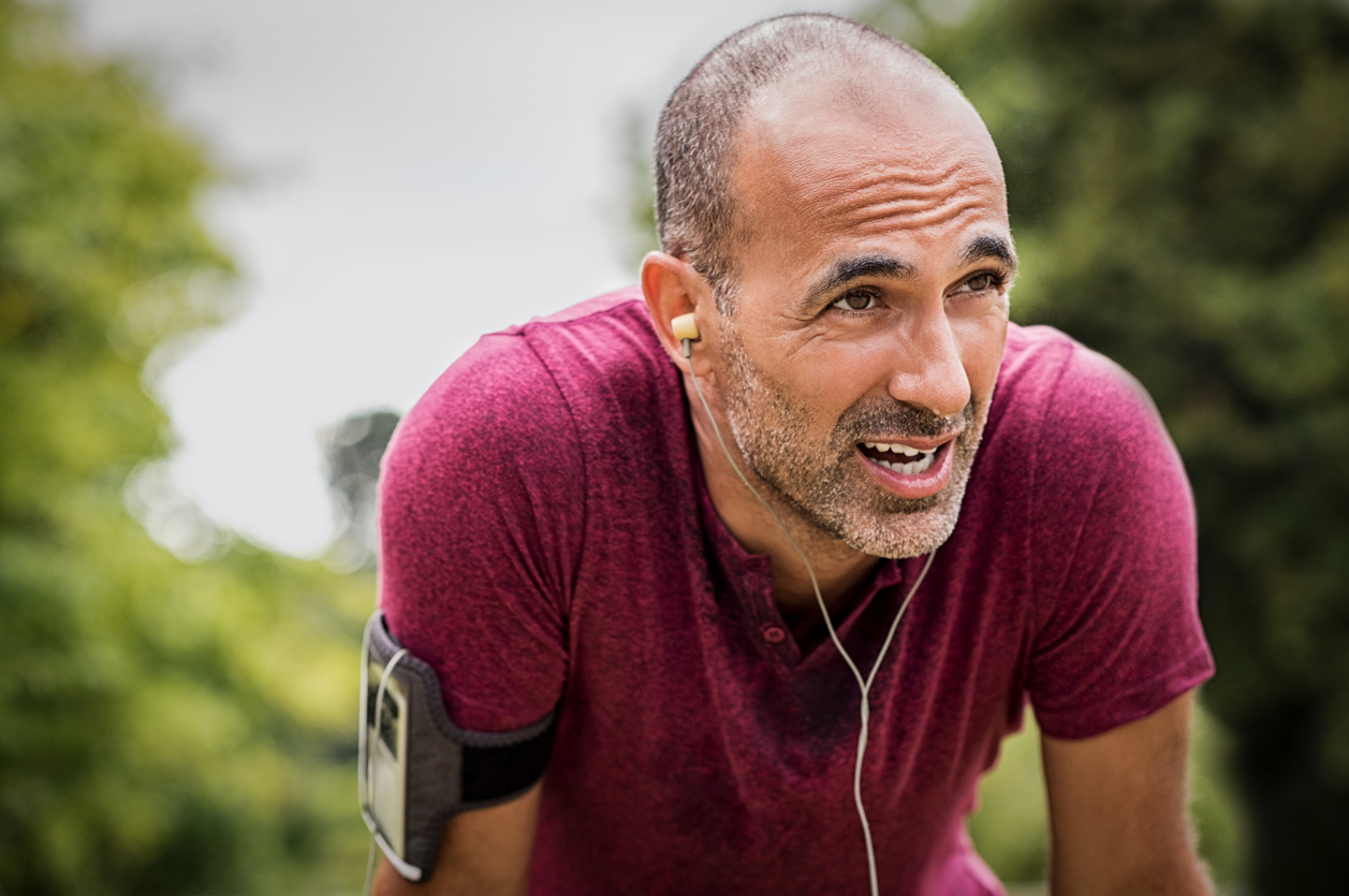 man breathing after jog