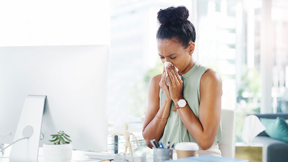 Woman suffering from spring allergies
