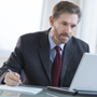 Man Sitting At Desk
