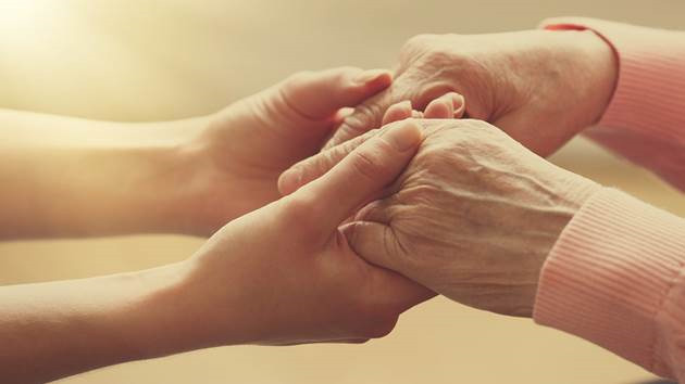 Photo of hands reaching out and grasping